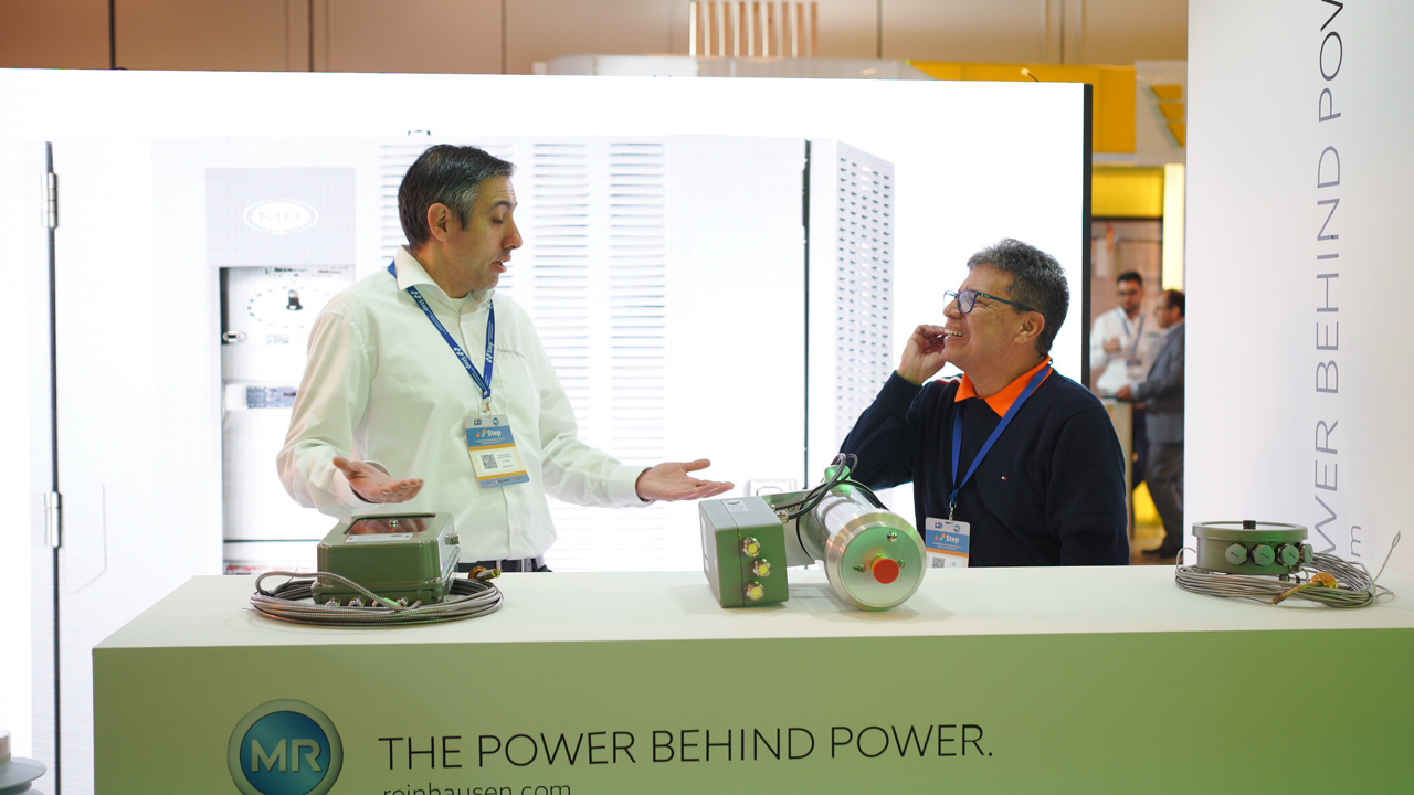 Attendees interacting at the STEP event